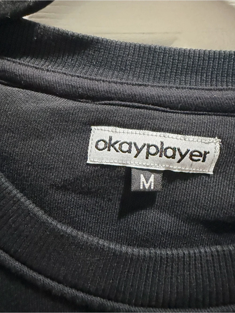 Marauders Black Crewneck Sweater with Striped Hem
